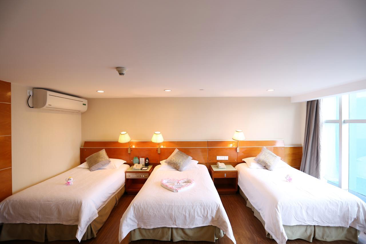 Yihe Hotel Ouzhuang Canton Chambre photo